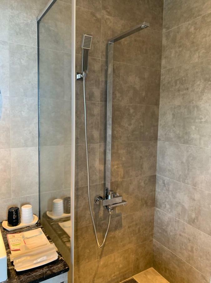 Two Easy Inn Цзюфэнь Экстерьер фото